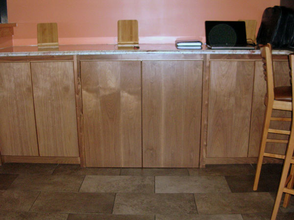 iPad charging stations below granite tops